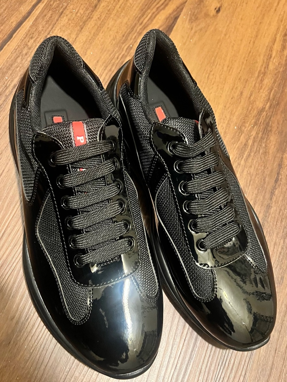 Prada Cups Black Patent and Mesh Low-Top Sneakers with Red Accent